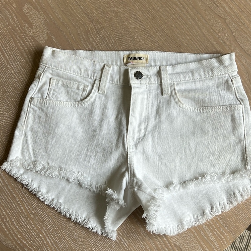 L'Agence Shorts
•   Mid-Rise
•   Raw-Edge Trim
•   Zip & Button Closure
